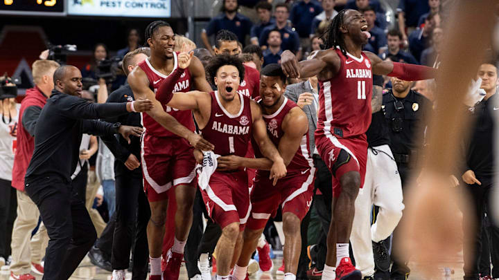 Alabama Crimson Tide guard Mark Sears (1) celebrates his game winner as Auburn Tigers take on Alabama Crimson Tide at Neville Arena in Auburn, Ala., on Saturday, March 8, 2025. Alabama Crimson Tide defeated Auburn Tigers 93-91 in overtime.
