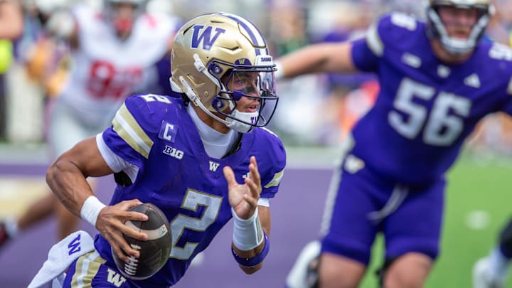 Demond Williams Jr. rolls out, looking for a receiver against Ohio State. Demond Williams Jr. rolls out, looking for a receiver against Ohio State.