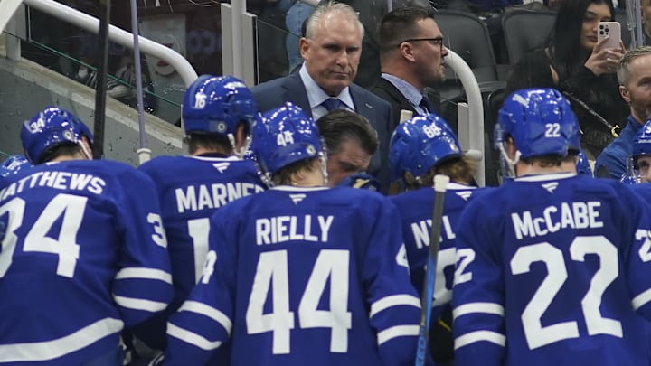 Jan 4, 2025; Toronto, Ontario, CAN; Toronto Maple Leafs head coach Craig Berube (center) talks to his team during a brek in the action against the Boston Bruins during the third period at Scotiabank Arena. Mandatory Credit: John E. Sokolowski-Imagn Images