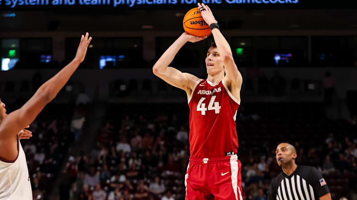 Mar 1, 2025; Columbia, South Carolina, USA; Arkansas Razorbacks forward Zvonimir Ivisic (44) attempts a three point basket against the South Carolina Gamecocks in the second half at Colonial Life Arena. Mandatory Credit: Jeff Blake-Imagn Images