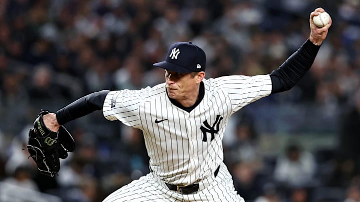 Oct 15, 2024; Bronx, New York, USA; New York Yankees pitcher Tim Hill (54) pitches during the fifth inning against the Cleveland Guardians in game two of the ALCS for the 2024 MLB Playoffs at Yankee Stadium. Mandatory Credit: Wendell Cruz-Imagn Images