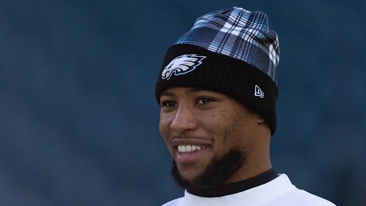 Jan 5, 2025; Philadelphia, Pennsylvania, USA; Philadelphia Eagles running back Saquon Barkley looks on before a game against the New York Giants at Lincoln Financial Field.  