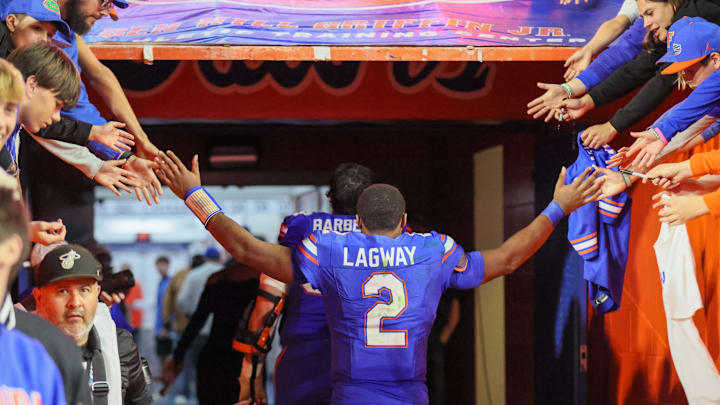 Florida quarterback DJ Lagway (2) leaves the field after beating Florida State 40-21 during an NCAA football game at Steve Spurrier Field at Ben Hill Griffin Stadium in Gainesville, FL on Saturday, November 29, Florida beat Florida State 40-21.2025. [Alan Youngblood/Gainesville Sun]