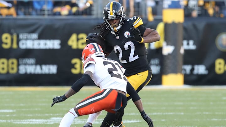 Pittsburgh Steelers running back Najee Harris carries the ball against Cleveland Browns cornerback Denzel Ward during the third quarter at Acrisure Stadium. 