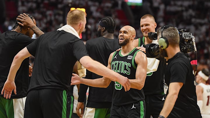 Apr 29, 2024; Miami, Florida, USA; Boston Celtics guard Derrick White (9) celebrates a Celtics lead