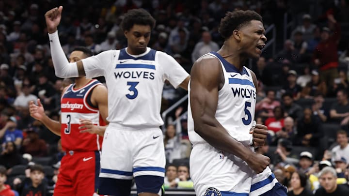 Jan 4, 2026; Washington, District of Columbia, USA; Minnesota Timberwolves guard Anthony Edwards (5) reacts after a dunk against the Washington Wizards in the third quarter at Capital One Arena.