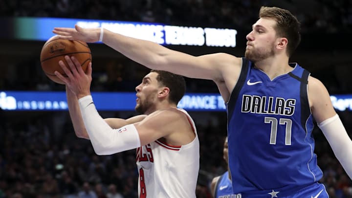 Chicago Bulls guard Zach LaVine (8) drives to the basket past Dallas Mavericks forward Luka Doncic (77) during the fourth quarter at American Airlines Center. Mandatory Credit: Kevin Jairaj-Imagn Images