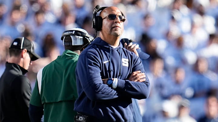 Penn State coach James Franklin looks to the scoreboard during a Big Ten football game against the Ohio State Buckeyes at Beaver Stadium.