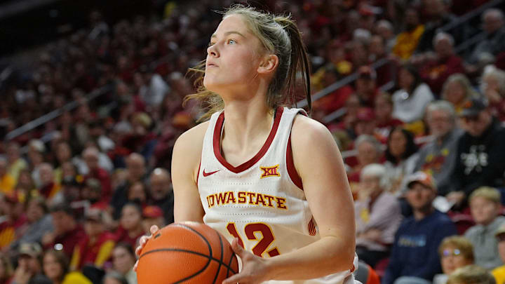 Iowa State Cyclones' guard Kenzie Hare (12) takes a three-point shot against UCF during the second quarter in the Big-12 women’s basketball on Jan. 31, 2026, at Hilton Coliseum in Ames, Iowa.