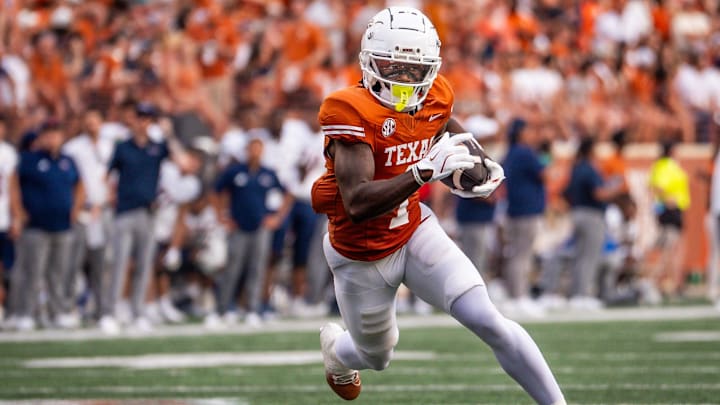 Sep 14, 2024; Austin, Texas, USA; Texas Longhorns wide receiver Johntay Cook II (1) runs the ball for a touchdown against the UTSA Roadrunners in the first quarter at Darrell K Royal–Texas Memorial Stadium. Mandatory Credit: Sara Diggins/USA TODAY Network via Imagn Images