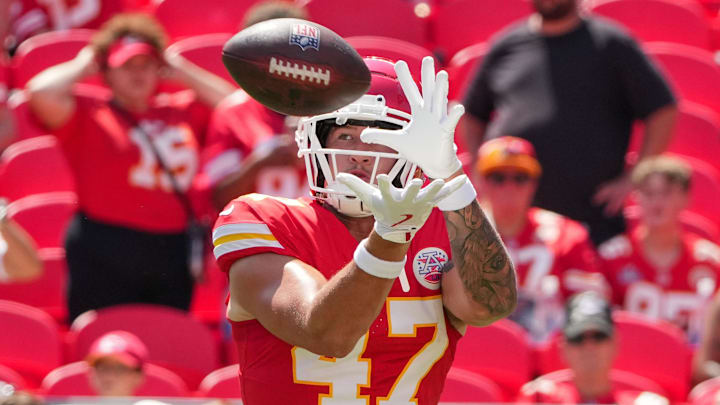 Aug 17, 2024; Kansas City, Missouri, USA; Kansas City Chiefs tight end Baylor Cupp (47) warms up against the Detroit Lions prior to the game at GEHA Field at Arrowhead Stadium.