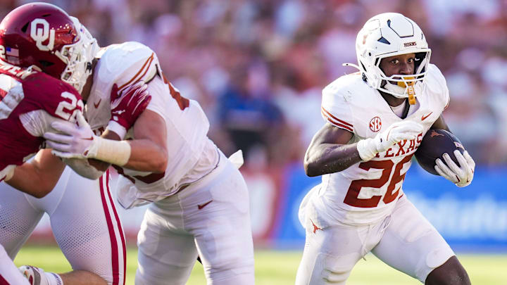 Texas Longhorns running back Quintrevion Wisner rushes against the Oklahoma Sooners.