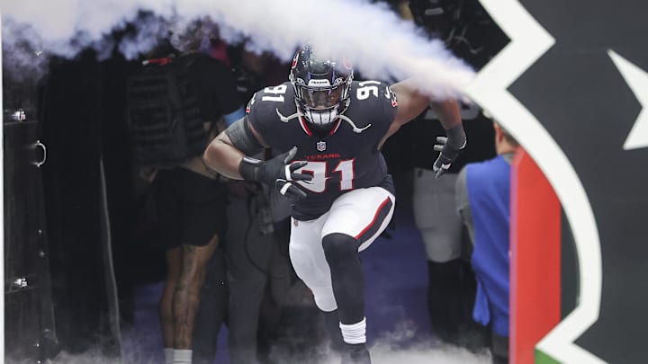 Oct 27, 2024; Houston, Texas, USA; Houston Texans defensive tackle Folorunso Fatukasi (91) runs onto the field before the game against the Indianapolis Colts at NRG Stadium. Mandatory Credit: Troy Taormina-Imagn Images Oct 27, 2024; Houston, Texas, USA; Houston Texans defensive tackle Folorunso Fatukasi (91) runs onto the field before the game against the Indianapolis Colts at NRG Stadium. Mandatory Credit: Troy Taormina-Imagn Images