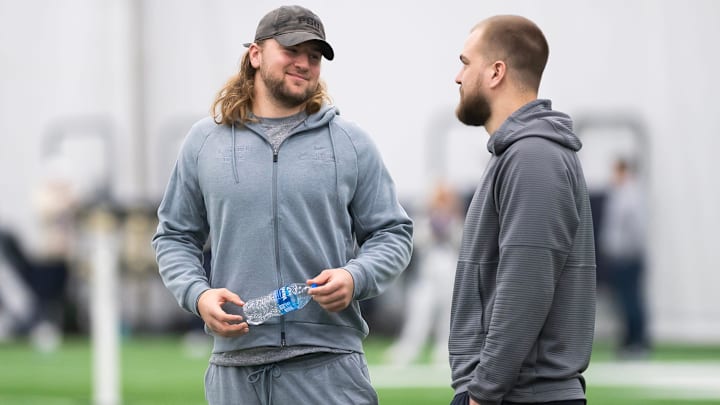 Former Penn State tight end Tyler Warren, left, talks with letterman Pat Freiermuth during Penn State's Pro Day in Holuba Hall. 