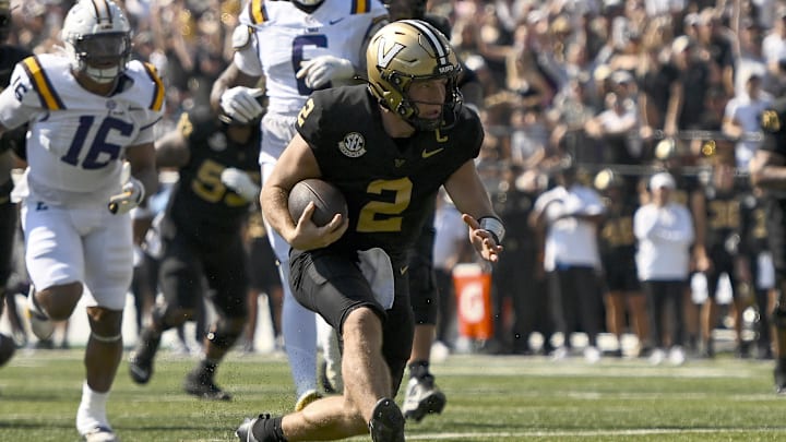 Oct 18, 2025; Nashville, Tennessee, USA; Vanderbilt Commodores quarterback Diego Pavia (2) runs with the ball against the Louisiana State Tigers during the first half at FirstBank Stadium. Mandatory Credit: Steve Roberts-Imagn Images Oct 18, 2025; Nashville, Tennessee, USA; Vanderbilt Commodores quarterback Diego Pavia (2) runs with the ball against the Louisiana State Tigers during the first half at FirstBank Stadium. Mandatory Credit: Steve Roberts-Imagn Images