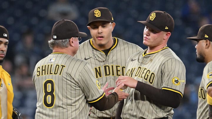 May 21, 2025; Toronto, Ontario, CAN; San Diego Padres manager Mike Shildt (8) relieves pitcher Adrian Morejon (50) in the seventh inning against the Toronto Blue Jays at Rogers Centre. Mandatory Credit: Dan Hamilton-Imagn Images May 21, 2025; Toronto, Ontario, CAN; San Diego Padres manager Mike Shildt (8) relieves pitcher Adrian Morejon (50) in the seventh inning against the Toronto Blue Jays at Rogers Centre. Mandatory Credit: Dan Hamilton-Imagn Images