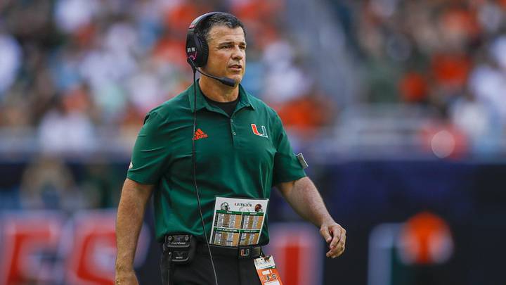 Sep 3, 2022; Miami Gardens, Florida, USA; Miami Hurricanes head coach Mario Cristobal watches from the sideline during the second quarter against the Bethune Cookman Wildcats at Hard Rock Stadium. Mandatory Credit: Sam Navarro-Imagn Images