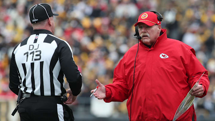 Dec 25, 2024; Pittsburgh, Pennsylvania, USA;  Kansas City Chiefs head coach Andy Reid (right) gestures to down judge Danny Short (113) after an excessive celebration penalty on the Chiefs against the Pittsburgh Steelers during the first quarter at Acrisure Stadium. Mandatory Credit: Charles LeClaire-Imagn Images