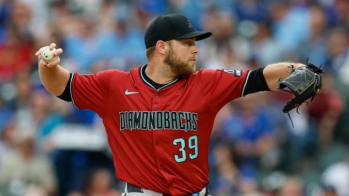 Apr 18, 2025; Chicago, Illinois, USA; Arizona Diamondbacks starting pitcher Corbin Burnes (39) delivers a pitch against the Chicago Cubs during the first inning at Wrigley Field. Mandatory Credit: Kamil Krzaczynski-Imagn Images
