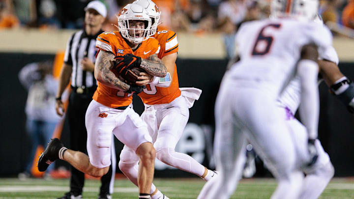 Aug 28, 2025; Stillwater, Oklahoma, USA; Oklahoma State Cowboys wide receiver Gavin Freeman (17) runs the ball during the second half against the Tennessee Martin Skyhawks at Boone Pickens Stadium. Mandatory Credit: William Purnell-Imagn Images Aug 28, 2025; Stillwater, Oklahoma, USA; Oklahoma State Cowboys wide receiver Gavin Freeman (17) runs the ball during the second half against the Tennessee Martin Skyhawks at Boone Pickens Stadium. Mandatory Credit: William Purnell-Imagn Images