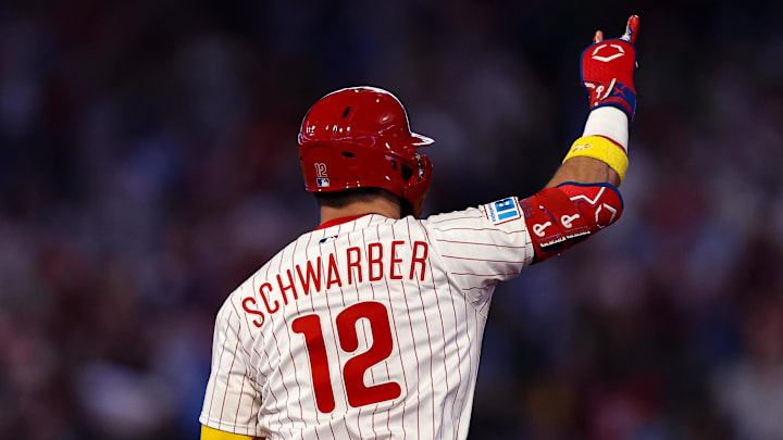 Sep 13, 2025; Philadelphia, Pennsylvania, USA; Philadelphia Phillies outfielder Kyle Schwarber (12) reacts to his home run against the Kansas City Royals during the fifth inning at Citizens Bank Park. Mandatory Credit: Bill Streicher-Imagn Images Sep 13, 2025; Philadelphia, Pennsylvania, USA; Philadelphia Phillies outfielder Kyle Schwarber (12) reacts to his home run against the Kansas City Royals during the fifth inning at Citizens Bank Park. Mandatory Credit: Bill Streicher-Imagn Images
