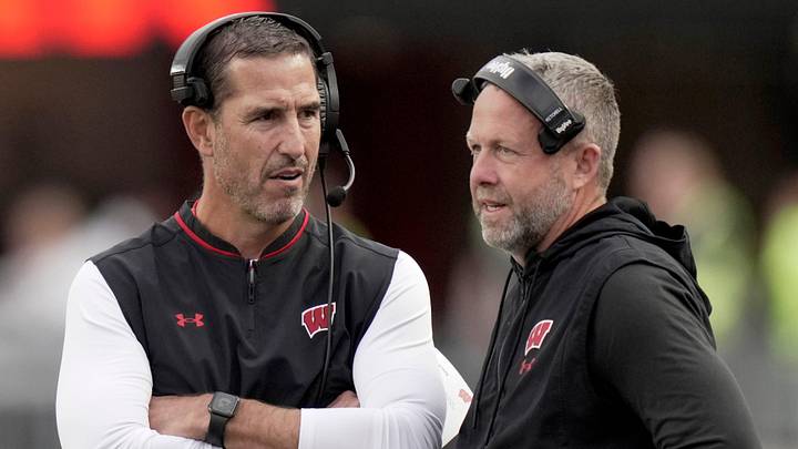 Wisconsin head coach Luke Fickell, left, talks with outside linebackers/special teams coach Matt Mitchell. Wisconsin head coach Luke Fickell, left, talks with outside linebackers/special teams coach Matt Mitchell.