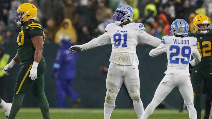 Nov 3, 2024; Green Bay, Wisconsin, USA; Detroit Lions defensive end Levi Onwuzurike (91) celebrates after a missed field goal attempt by the Green Bay Packers at Lambeau Field. Mandatory Credit: Tork Mason-Imagn Images Nov 3, 2024; Green Bay, Wisconsin, USA; Detroit Lions defensive end Levi Onwuzurike (91) celebrates after a missed field goal attempt by the Green Bay Packers at Lambeau Field. Mandatory Credit: Tork Mason-Imagn Images