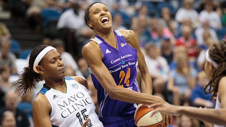 Jun 27, 2015; Minneapolis, MN, USA; Phoenix Mercury guard DeWanna Bonner (24) shoots in the first quarter against the Minnesota Lynx forward Asjha Jones (15) at Target Center. Mandatory Credit: Brad Rempel-Imagn Images