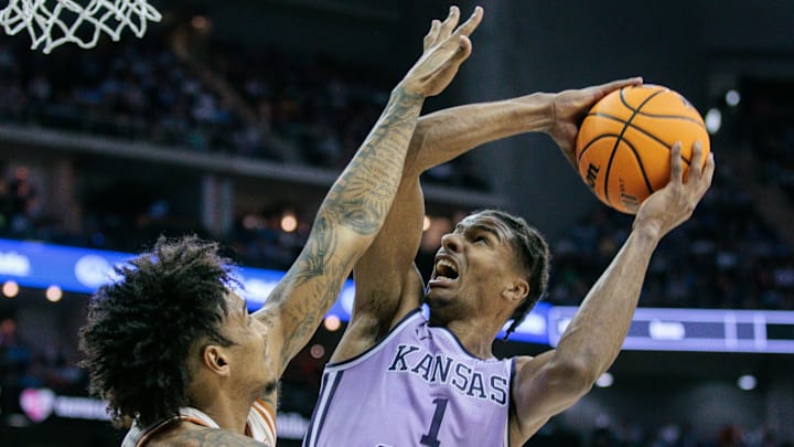 Mar 13, 2024; Kansas City, MO, USA; Kansas State Wildcats forward David N'Guessan (1) goes up for a contested shot.