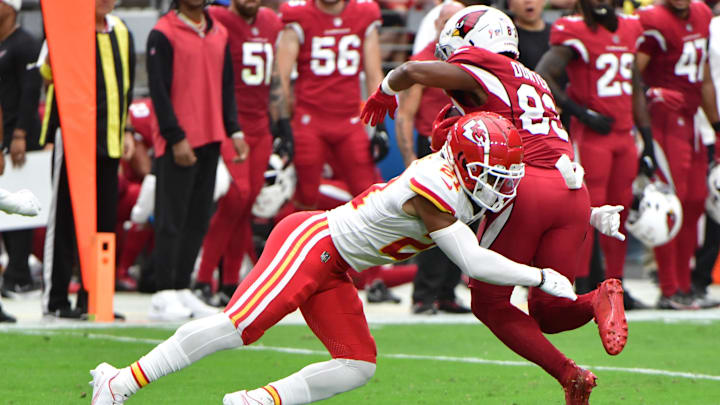 Sep 11, 2022; Glendale, Arizona, USA; Kansas City Chiefs cornerback Trent McDuffie (21) tackles Arizona Cardinals wide receiver Greg Dortch (83) in the first half at State Farm Stadium. Mandatory Credit: Matt Kartozian-Imagn Images Sep 11, 2022; Glendale, Arizona, USA; Kansas City Chiefs cornerback Trent McDuffie (21) tackles Arizona Cardinals wide receiver Greg Dortch (83) in the first half at State Farm Stadium. Mandatory Credit: Matt Kartozian-Imagn Images