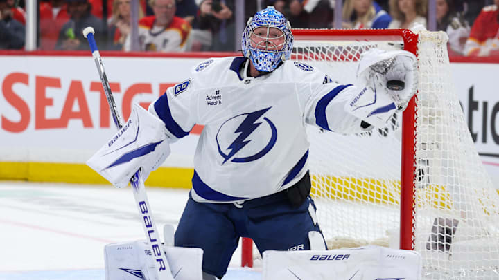 Apr 26, 2025; Sunrise, Florida, USA; Tampa Bay Lightning goaltender Andrei Vasilevskiy (88) makes a save against the Florida Panthers in the first period during game three of the first round of the 2025 Stanley Cup Playoffs at Amerant Bank Arena. Mandatory Credit: Nathan Ray Seebeck-Imagn Images