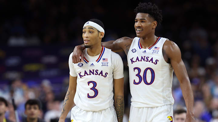 Kansas guards Dajuan Harris Jr. and Ochai Agbaji.