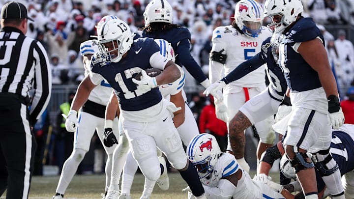 Penn State Nittany Lions running back Kaytron Allen (13) runs to the end zone against the SMU Mustangs in a College Football Playoff game at Beaver Stadium. Penn State Nittany Lions running back Kaytron Allen (13) runs to the end zone against the SMU Mustangs in a College Football Playoff game at Beaver Stadium.