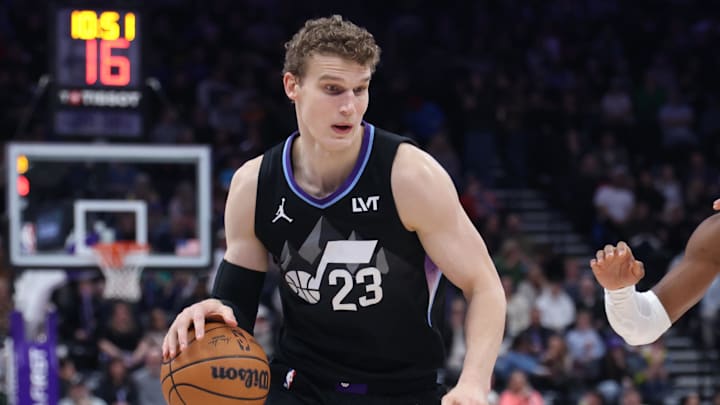 Feb 21, 2025; Salt Lake City, Utah, USA; Utah Jazz forward Lauri Markkanen dribbles the ball against the Oklahoma City Thunder during the third quarter at Delta Center. Mandatory Credit: Rob Gray-Imagn Images