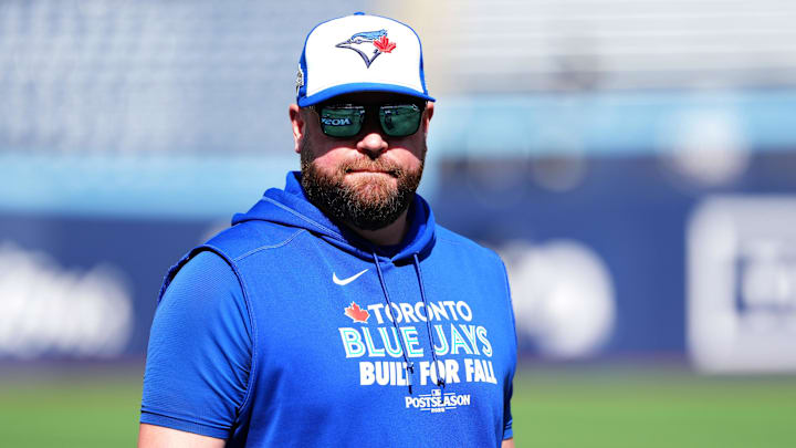 Oct 4, 2025; Toronto, Ontario, CAN; Toronto Blue Jays manager John Schneider (14) before game one against the New York Yankees in the ALDS round for the 2025 MLB playoffs at Rogers Centre. Oct 4, 2025; Toronto, Ontario, CAN; Toronto Blue Jays manager John Schneider (14) before game one against the New York Yankees in the ALDS round for the 2025 MLB playoffs at Rogers Centre.