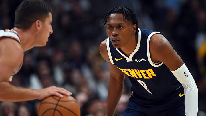 Oct 25, 2025; Denver, Colorado, USA; Denver Nuggets guard Peyton Watson (8) defends against Phoenix Suns guard Collin Gillespie (12) during the first half at Ball Arena. Mandatory Credit: Christopher Hanewinckel-Imagn Images Oct 25, 2025; Denver, Colorado, USA; Denver Nuggets guard Peyton Watson (8) defends against Phoenix Suns guard Collin Gillespie (12) during the first half at Ball Arena. Mandatory Credit: Christopher Hanewinckel-Imagn Images