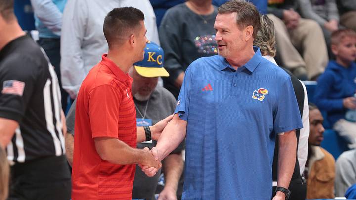 Kansas Jayhawks head coach Bill Self shakes hands with Pittsburg State Gorillas head coach Jeff Boschee before tipoff inside Allen Fieldhouse on Oct. 16, 2026. Kansas Jayhawks head coach Bill Self shakes hands with Pittsburg State Gorillas head coach Jeff Boschee before tipoff inside Allen Fieldhouse on Oct. 16, 2026.