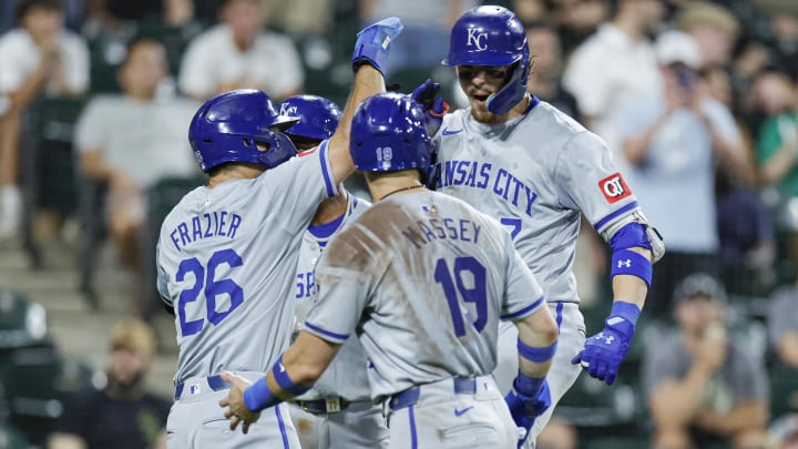 Jul 28, 2024; Chicago, Illinois, USA; Kansas City Royals shortstop Bobby Witt Jr. (7) celebrates with teammates after hitting a grand slam against the Chicago White Sox during the eight inning at Guaranteed Rate Field. Mandatory Credit: Kamil Krzaczynski-USA TODAY Sports