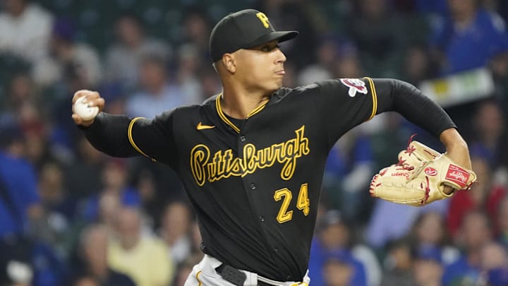 Sep 21, 2023; Chicago, Illinois, USA; Pittsburgh Pirates starting pitcher Johan Oviedo (24) throws the ball against the Chicago Cubs during the first inning at Wrigley Field. Mandatory Credit: David Banks-Imagn Images