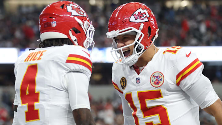 Nov 27, 2025; Arlington, Texas, USA; Kansas City Chiefs wide receiver Rashee Rice (4) and Kansas City Chiefs quarterback Patrick Mahomes (15) celebrate after a play against the Dallas Cowboys during the first quarter at AT&T Stadium. Mandatory Credit: Kevin Jairaj-Imagn Images
