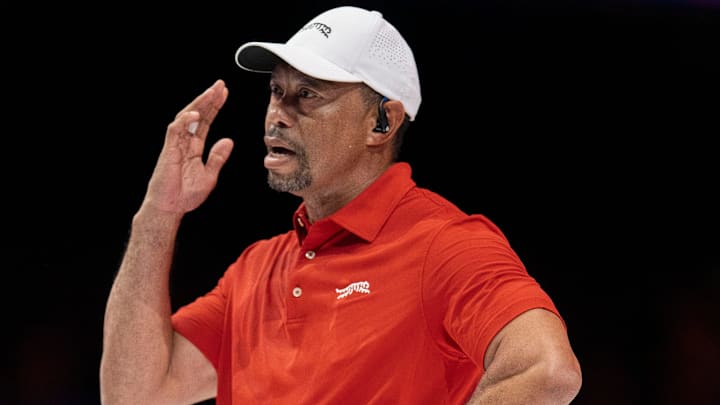 Tiger Woods of Jupiter Links GC is unhappy with his shot during a TGL match against Atlanta Drive GC at SoFi Center on March 4, 2025, in Palm Beach Gardens, Florida.