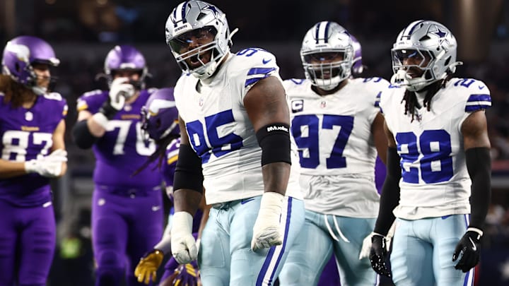 Dallas Cowboys DT Kenny Clark celebrates after a play during the first half against the Minnesota Vikings.