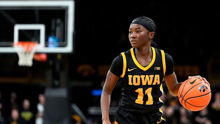 Iowa guard Chit-Chat Wright (11) sets up the offense against the Oregon Ducks Jan. 15, 2026 at Carver-Hawkeye Arena in Iowa City, Iowa.