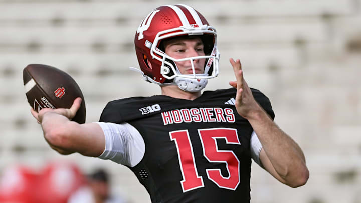 Indiana’s Fernando Mendoza (15) throws a pass during spring practice at Memorial Stadium on Thursday, April 3, 2025.