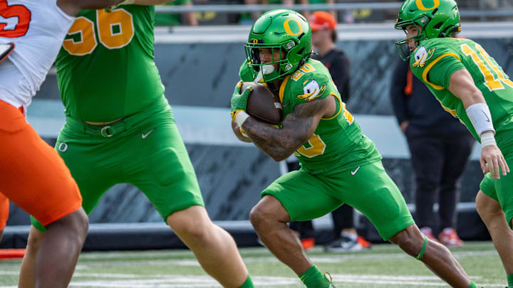 Oregon running back Makhi Hughes carries the ball as the Oregon Ducks host the Oklahoma State Cowboys on Sept. 6, 2025, at Autzen Stadium in Eugene, Oregon.