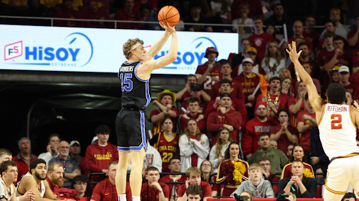 Mar 4, 2025; Ames, Iowa, USA; Brigham Young Cougars forward Richie Saunders (15) shoots against the Iowa State Cyclones at James H. Hilton Coliseum. Mandatory Credit: Reese Strickland-Imagn Images Mar 4, 2025; Ames, Iowa, USA; Brigham Young Cougars forward Richie Saunders (15) shoots against the Iowa State Cyclones at James H. Hilton Coliseum. Mandatory Credit: Reese Strickland-Imagn Images