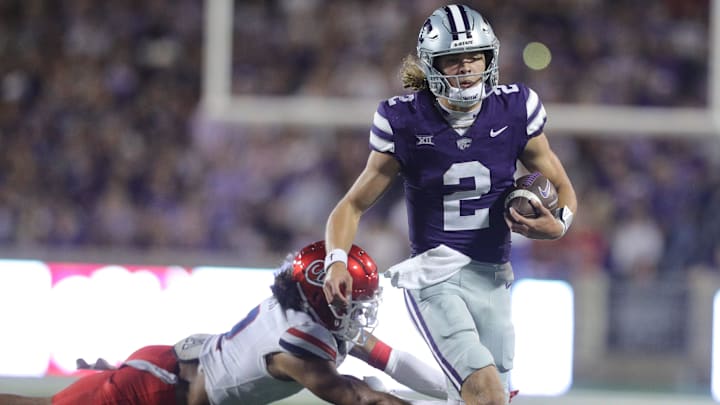 Kansas State Wildcats quarterback Avery Johnson (2) runs the ball during the fourth quarter of the game against Arizona at Bill Snyder Family Stadium on Friday, September 13, 2024.