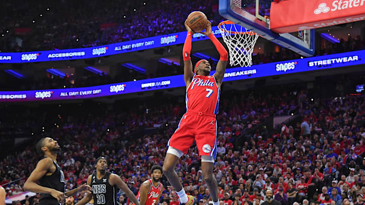 Apr 15, 2023; Philadelphia, Pennsylvania, USA; Philadelphia 76ers forward Jalen McDaniels (7) slam dunks against the Brooklyn Nets during the third quarter of game one of the 2023 NBA playoffs at Wells Fargo Center. Mandatory Credit: Eric Hartline-Imagn Images