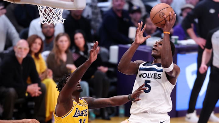 Apr 22, 2025; Los Angeles, California, USA; Minnesota Timberwolves guard Anthony Edwards (5) goes to the basket against Los Angeles Lakers forward Dorian Finney-Smith (17) during the first quarter of game two of first round for the 2024 NBA Playoffs at Crypto.com Arena. Mandatory Credit: Kiyoshi Mio-Imagn Images Apr 22, 2025; Los Angeles, California, USA; Minnesota Timberwolves guard Anthony Edwards (5) goes to the basket against Los Angeles Lakers forward Dorian Finney-Smith (17) during the first quarter of game two of first round for the 2024 NBA Playoffs at Crypto.com Arena. Mandatory Credit: Kiyoshi Mio-Imagn Images