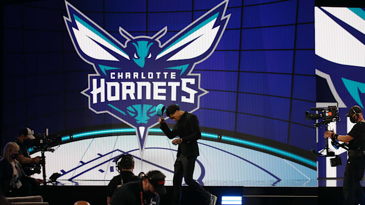 Jul 29, 2021; Brooklyn, New York, USA; James Bouknight (Connecticut) walks off the stage after being selected as the number eleven overall pick by the Charlotte Hornets in the first round of the 2021 NBA Draft at Barclays Center. Mandatory Credit: Brad Penner-USA TODAY Sports